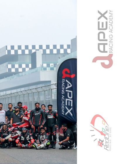 The community is what makes our track days special. Riders gather for a group photo in front of the iconic BIC pit building.