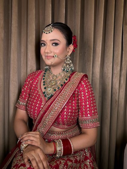 A happy bride ready for her big day, adorned in our beautiful temple jewellery.
