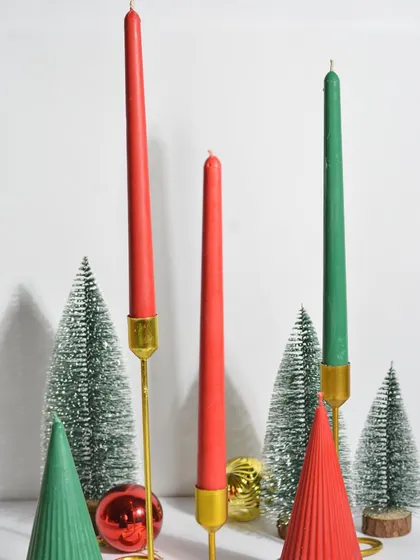 My Christmas taper candles are perfect for adding an elegant touch to your holiday dinner table. They come in festive red and green colors.