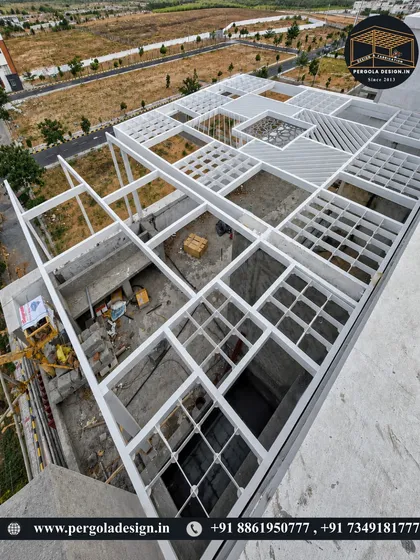 This work-in-progress shot shows the sheer scale of the custom rooftop structure, covering a vast area with a complex, multi-patterned design.