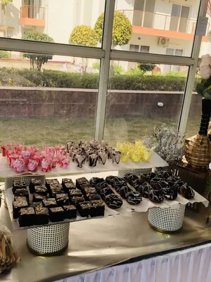 No celebration is complete without a tempting dessert spread. We offer a wide variety of sweet treats, including rich chocolate brownies, creamy mousses, and decorated donuts, all beautifully arranged to satisfy every sweet tooth.
