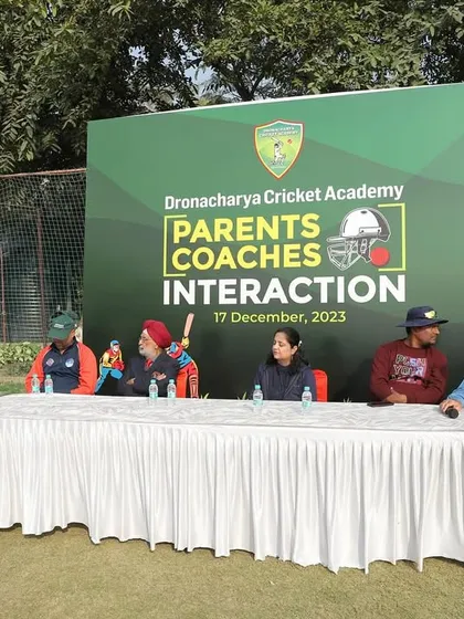A parent-coach interaction session in progress, featuring a panel that includes our coaches and a professional dietician. This collaborative approach ensures the holistic well-being of our players.