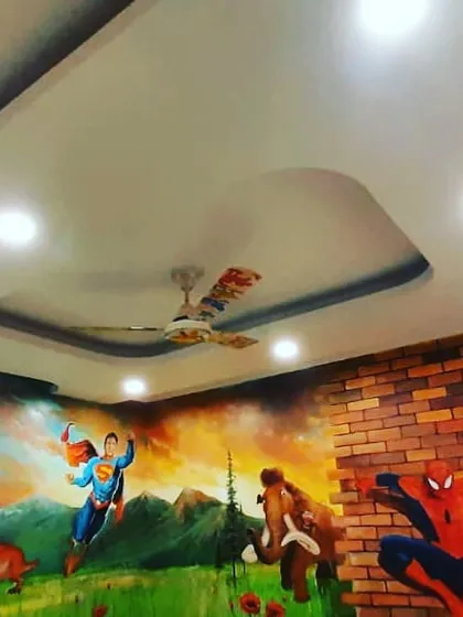 We create entire worlds for kids' rooms. This project combines a full-wall painted mural featuring Superman and other characters with a custom 3D Spiderman relief sculpture that appears to burst through the brickwork.