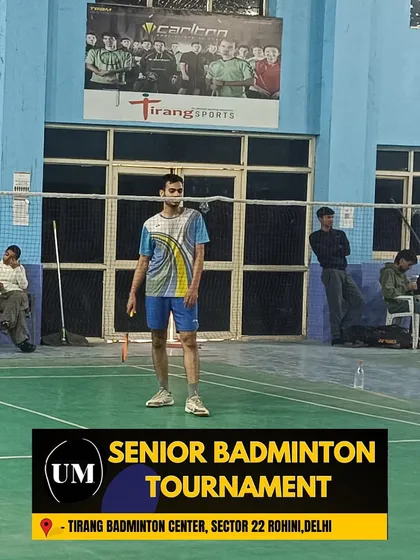 A player focused during a match in the senior tournament. The competitive spirit is ageless.