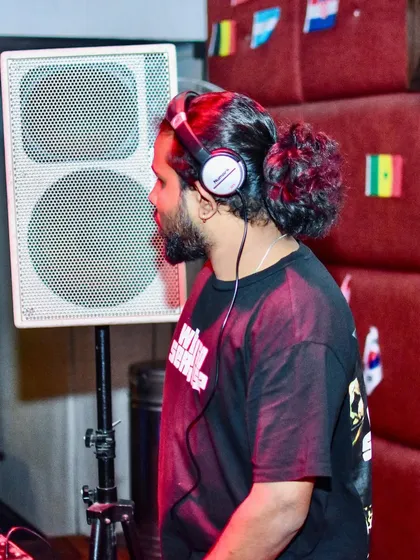 These shots capture me in my element, from different angles and at various events. Each one is a glimpse into my life as a music maker, focused on the craft and connecting with the crowd.