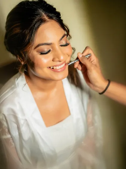 A behind-the-scenes glimpse of creating the perfect bridal look for our bride from Dubai, focusing on a flawless airbrush application.