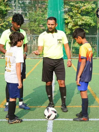 The coin toss before the match against Thane City FC. This moment, with the referee and team captains, signifies the start of a fair and competitive game.