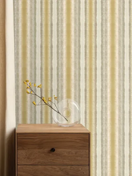 This vertical stripe pattern in shades of yellow and grey has a textured, hand-painted feel. It's a simple yet elegant design that adds height and subtle color to a bedroom or study.