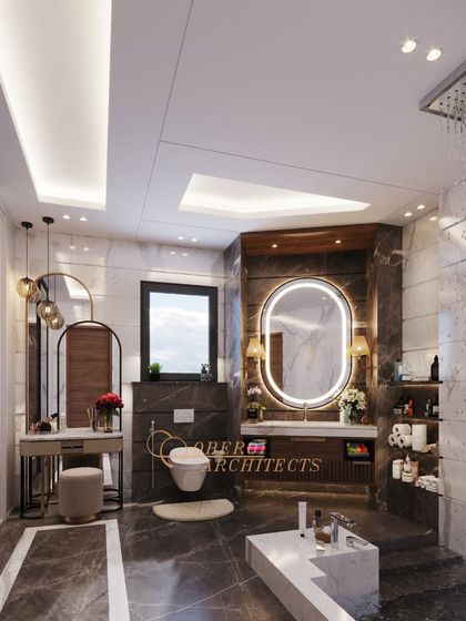 This bathroom is a complete experience, featuring a rain shower, a sleek vanity with accent lighting, and a dedicated dressing area with integrated wardrobes.