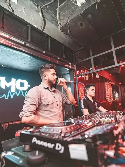 I’m not a background DJ. I’m a performer. Getting on the mic to hype the crowd is a huge part of my set. I make sure the energy never drops and the dance floor stays connected.