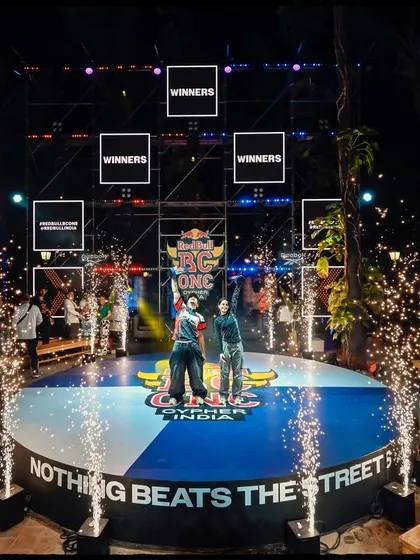 The grand finale. My event photography focuses on capturing the celebratory climax, using lighting and composition to frame the winners in their moment of triumph at the Red Bull BC One Cypher.