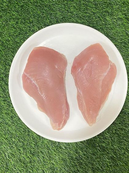 A clean shot of my fresh, boneless turkey breast. This lean protein is perfect for dogs needing a low-fat, high-protein diet.