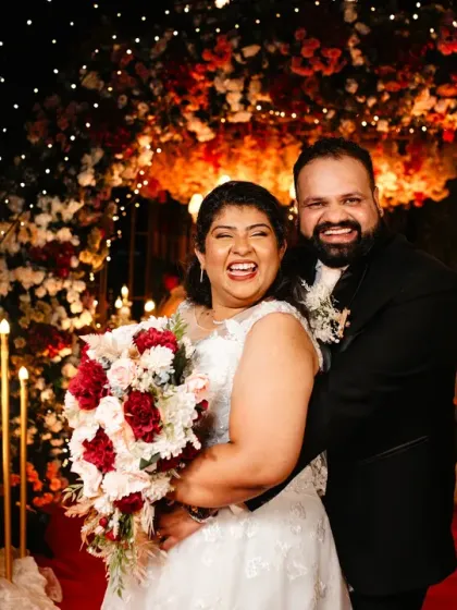 The kind of big, hearty laugh that lights up the entire frame. This portrait from a summer wedding reception captures the pure happiness and celebratory spirit of the day.