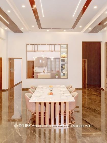 A grand and spacious dining hall with high ceilings and glossy marble floors. The design exudes luxury and is perfect for hosting large gatherings.