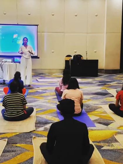 A yoga instructor guides our team through various asanas. We are grateful for experts who share their knowledge and help us lead a more balanced life.