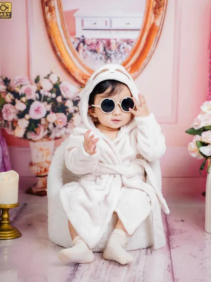Putting on her cool shades, this little fashionista is ready for her close-up. It's a fun and modern take on a princess theme.