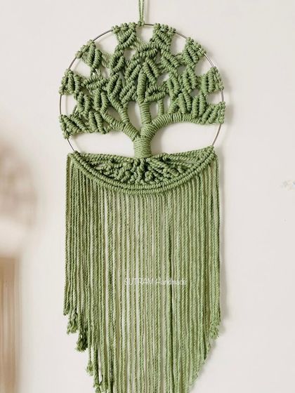 This Tree of Life is made in a rich olive green. It's a beautiful, earthy tone that brings a feeling of nature indoors. It measures 10x26 inches and is a perfect statement piece.