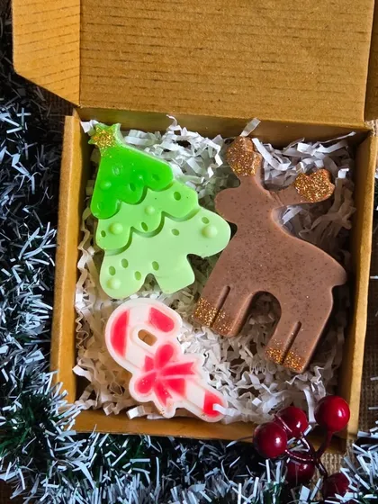 The Christmas soap trio, packaged in a simple kraft box, ready for gifting.