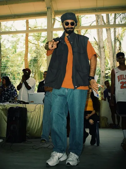 Another shot from the ARDS Spectra event, showing a different layered outfit. My style is adaptable for various streetwear looks, from simple tees to vests and baggy jeans.
