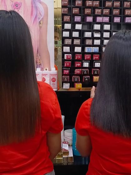 Two clients showing off their fresh Botox treatments. Notice how smooth and healthy both of their styles look.