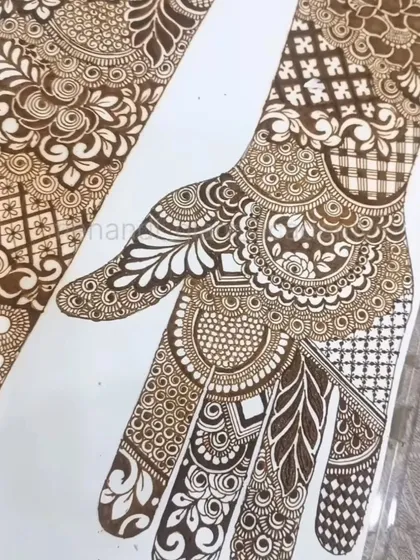 A practice sheet showcasing a very intricate and dense bridal design. I use these to plan out complex patterns before applying them.