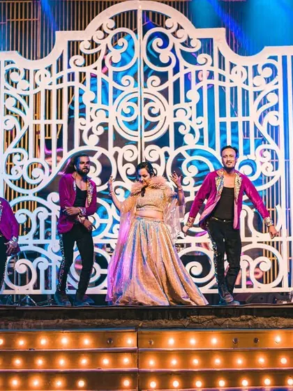 The bride and groom join our professional dancers on stage for a high-energy group number, making them feel like the lead stars of their own blockbuster film.