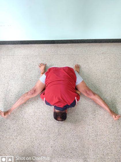 Kurmasana (Tortoise Pose). A deep forward bend that requires significant flexibility in the hips and hamstrings. It has a calming and introspective effect on the mind.