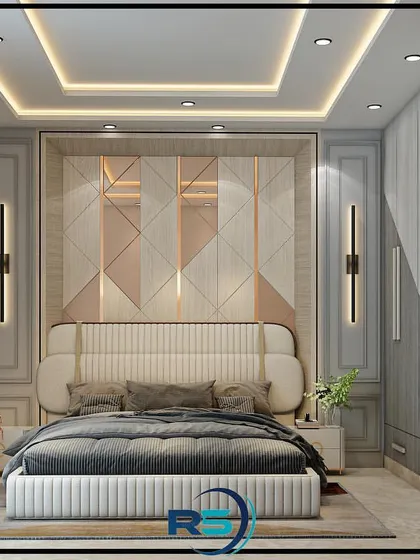 A sophisticated bedroom concept with a striking geometric headboard panel in rose gold and white. The design includes sleek wall-mounted lights and a full-wall wardrobe for ample storage.
