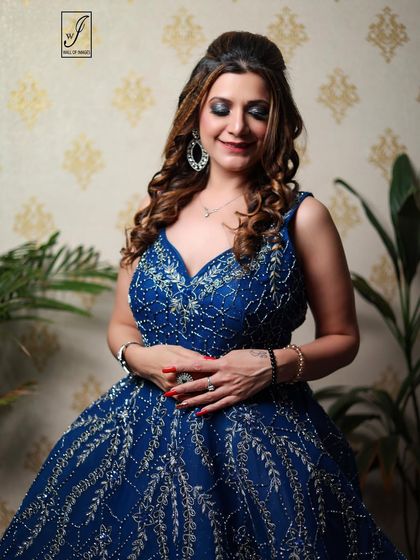 A candid, happy moment during the gown photoshoot, showing a different side of the model's personality.