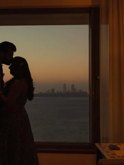 A quiet, intimate moment against the vast Mumbai skyline at sunset. This silhouette shot of Neelam and Moiz shows how we can use a cityscape to create a dramatic and deeply romantic portrait.