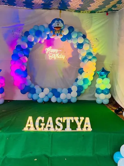 Another angle of the Doraemon birthday setup, showing the vibrant colors under different lighting.