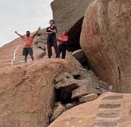 Adventurers on the boulders of Hampi. The unique landscape is as much an attraction as the temples.