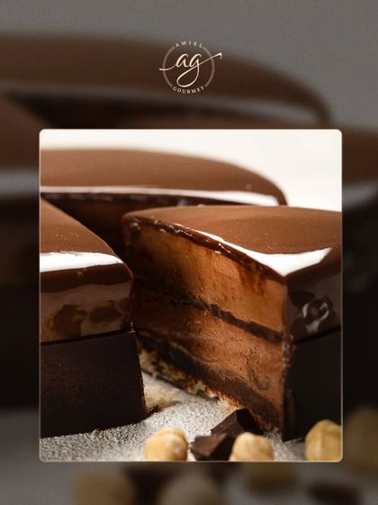A slice of my rich chocolate and hazelnut cake. The deep flavor of the chocolate mousse is complemented by the crunch of hazelnuts, creating a truly indulgent experience.