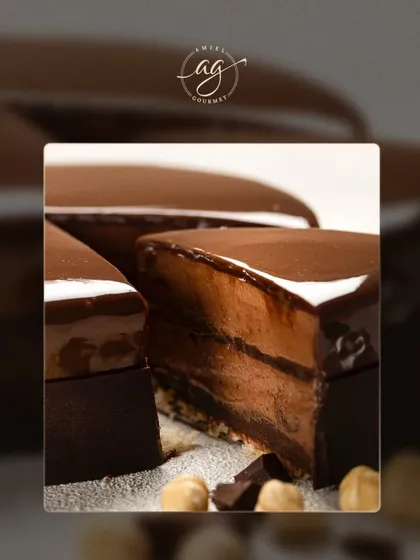 A slice of my rich chocolate and hazelnut cake. The deep flavor of the chocolate mousse is complemented by the crunch of hazelnuts, creating a truly indulgent experience.