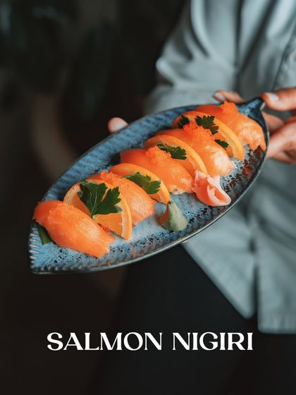 Classic Salmon Nigiri, showcasing the simple perfection of a slice of buttery salmon over hand-pressed rice.