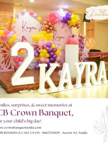 Celebrating Kayra's second birthday in style. The large light-up number '2' and name, paired with a butterfly-themed balloon arch, create a fantastic photo opportunity and a grand statement.