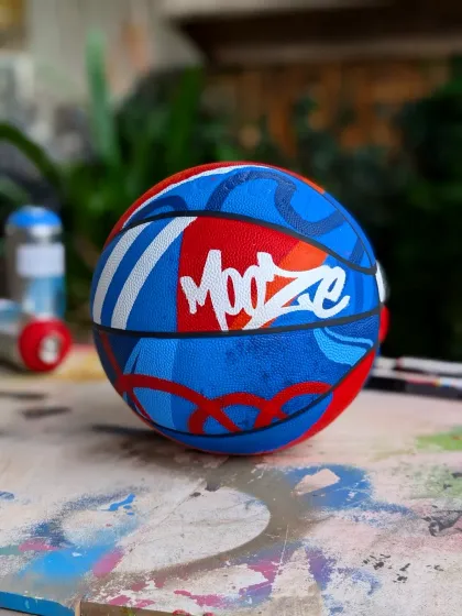 Another angle of the custom basketball, showing my 'Mooz' tag integrated into the design. Every piece I make has a personal touch.