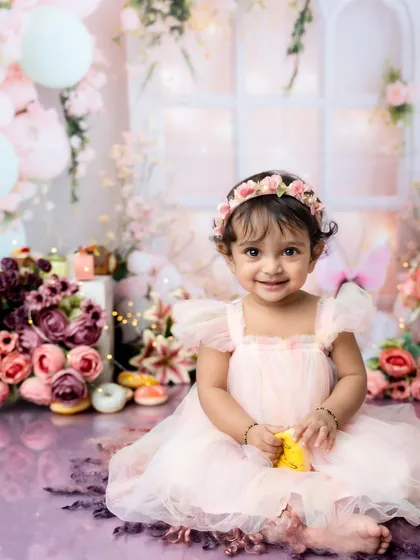 A perfect, heart-melting smile. This is a portrait her parents will treasure forever.