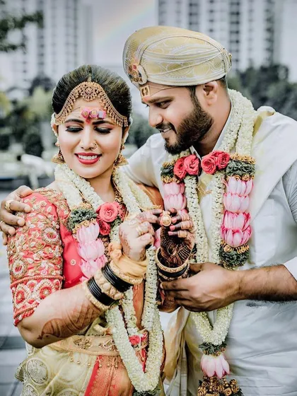 It's all about the happy moments. This beautiful couple shot captures the joy of the wedding day, with the bride's makeup looking fresh and radiant throughout the celebrations.