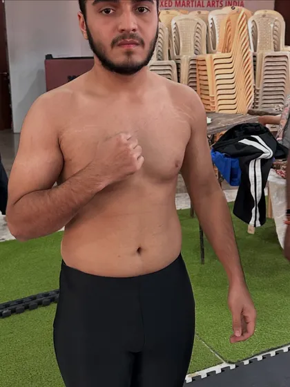 One of our fighters making weight and facing off before his match. The preparation is done, now it's time to perform.