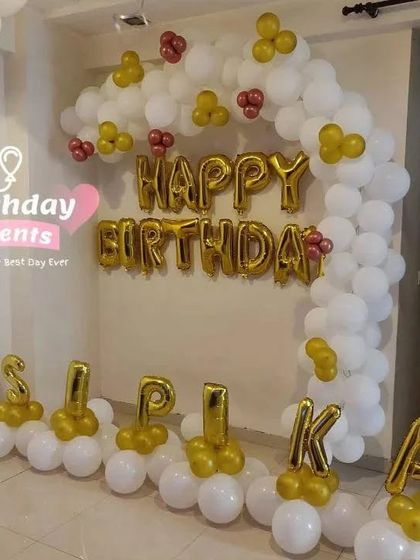 Another example of our personalized name decorations, this time spelling "SILPIKA" in gold foil letters as part of a larger balloon arch.