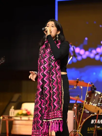 A soulful moment during a Hindi song performance. We cover everything from romantic ballads to high-energy dance numbers.