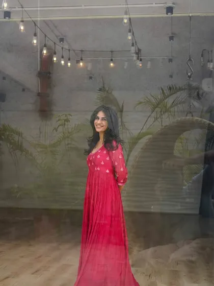 A posed shot from behind a glass window, giving a dreamy feel. This photo captures the artistic and thoughtful side of my dance persona.