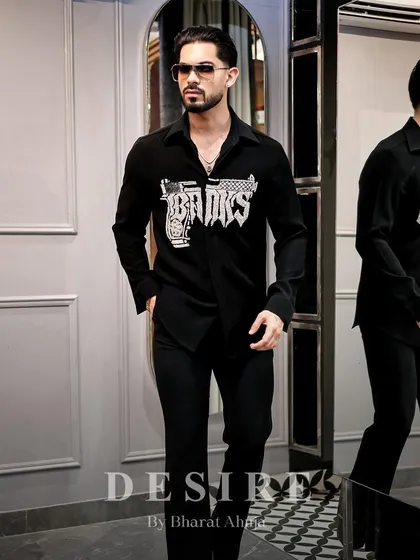 Dressed to dominate. The 'BAD BOYS' gun shirt is more than an outfit, it's an attitude.