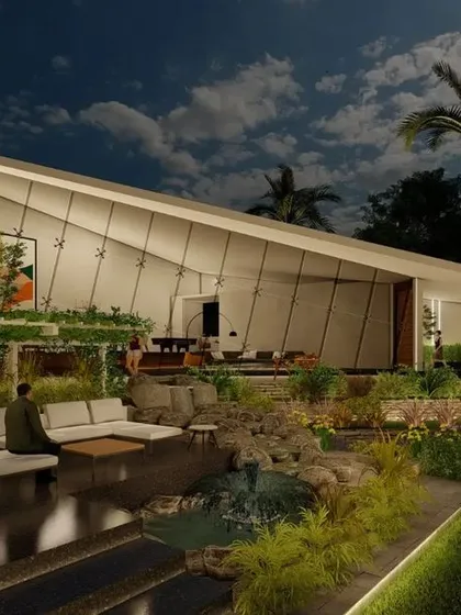 We design and build expansive farmhouse estates that harmonize architecture with nature. This one-acre project features a modern, angular main house seamlessly connected to a tranquil landscape with a custom water body and sunken seating, demonstrating our form-follows-function approach to luxury landscape design.