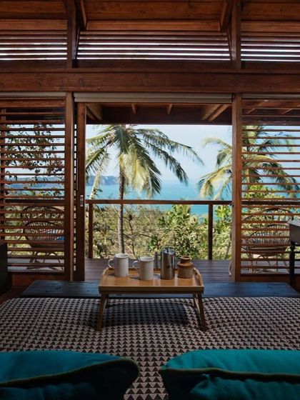 The beautiful wooden cottages at Cabo Serai, where our retreat participants unwind and reconnect with nature.
