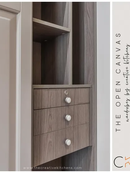 A detailed shot of the open carcass section of our "Open Canvas" wardrobe. The rich wood grain provides a warm, organic contrast to the smooth, neutral European membrane finish of the main body.