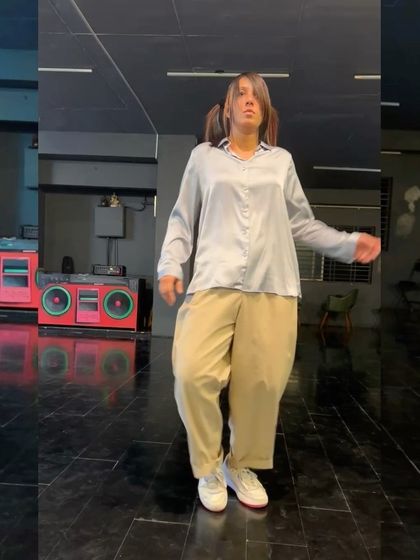 An instructor demonstrates the precision required for popping drills. Mastering these foundational movements is everything. It's the difference between a move that looks cool and a move that feels right.