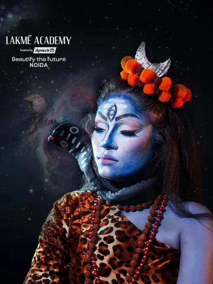 A detailed close-up of the Lord Shiva makeup. The third eye, the crescent moon, and the serene expression are all key elements that our students learn to create.