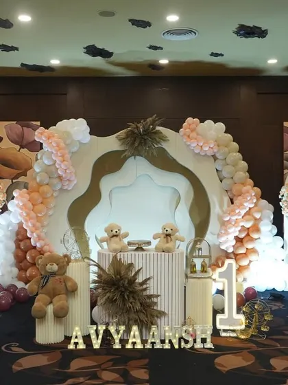 A modern and elegant take on the classic teddy bear theme. Using a neutral color palette with layered backdrops and soft lighting, this setup is perfect for a sophisticated first birthday celebration.